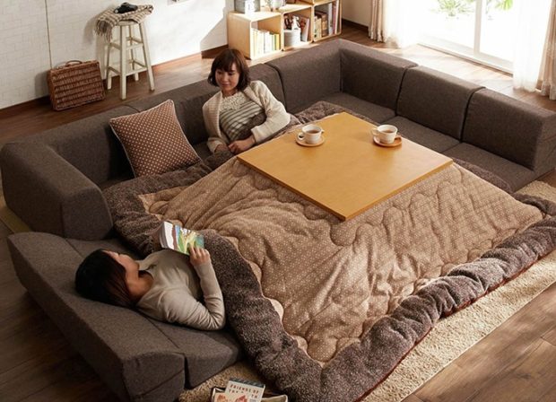 Kotatsu-Japanese-Heated-Table-With-Two-People-2-620x448.jpg